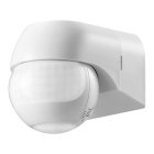 En vit rrelsesensor med justerbar instllning r monterad p en vggliknande bakgrund. Sensorn har en halvsfrisk lins och en tydlig LUX-markering fr ljusinstllning.