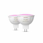 Tv Philips Hue White and Color GU5.3-lampa med rosa ljus visas i nrbild. Denna smarta ljusklla