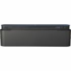 Ett fristende, svart vrmeelement med slimmad design fotograferat rakt framifrn