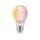 En klassisk A60 LED-lampa med f�rgskiftande ljus och synlig spiraltr�d visas mot vit bakgrund, vilket framh�ver dess dekorativa och smarta funktioner. Elbutik.se erbjuder denna ljusk�lla f�r flexibel och energieffektiv belysning i hemmet.