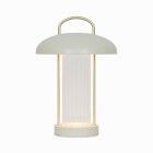 En portabel bordslampa i beige med cylinderformad ljuskropp och rund topp med handtag st�r centrerad mot ljus bakgrund. Lampan �r batteridriven och enkel att flytta, tillg�nglig som flexibel belysning hos Elbutik.se.