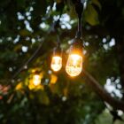 Tv� markpollare med smal, stilren design i svart finish visas mot vit bakgrund. Elbutik.se erbjuder dessa RGBW-tr�dg�rdslampor som drivs med 12V DC och passar perfekt f�r utomhusbelysning.