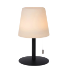 En bordslampa med svart rund fot, smal stam och vit konformad sk�rm visas t�nd mot ljus bakgrund. Elbutik.se presenterar modellen som kompakt st�mningsbelysning f�r bord, hyllor och mindre m�belytor.