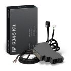 Perific Str�madapter RJ45-kit visas frilagd med svart rektangul�r adapterenhet, anslutningskablar och flera kontakter samlade bredvid. Elbutik.se erbjuder kitet som str�mf�rs�rjningsl�sning f�r kompatibla Perific-installationer med RJ45-anslutning.
