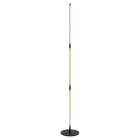 Svart golvlampa med rund fot och l�ng smal ljusarm.